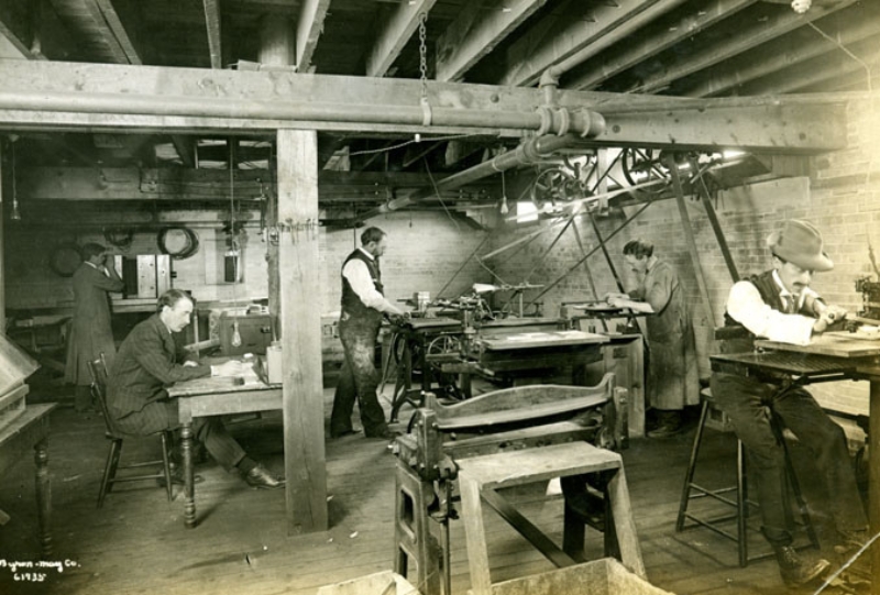 Early 1900s equipment running off steam powered belts