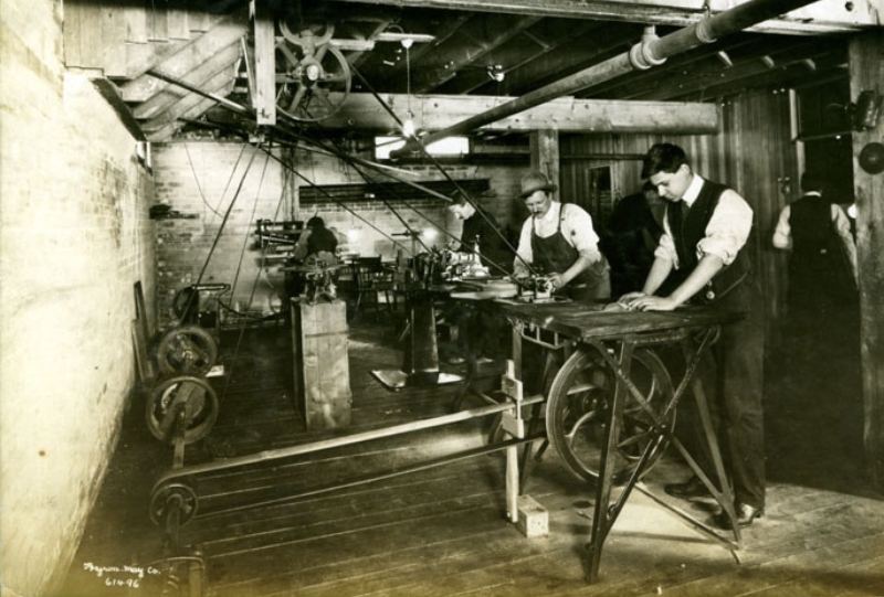 Early 1900s equipment running off steam powered belts